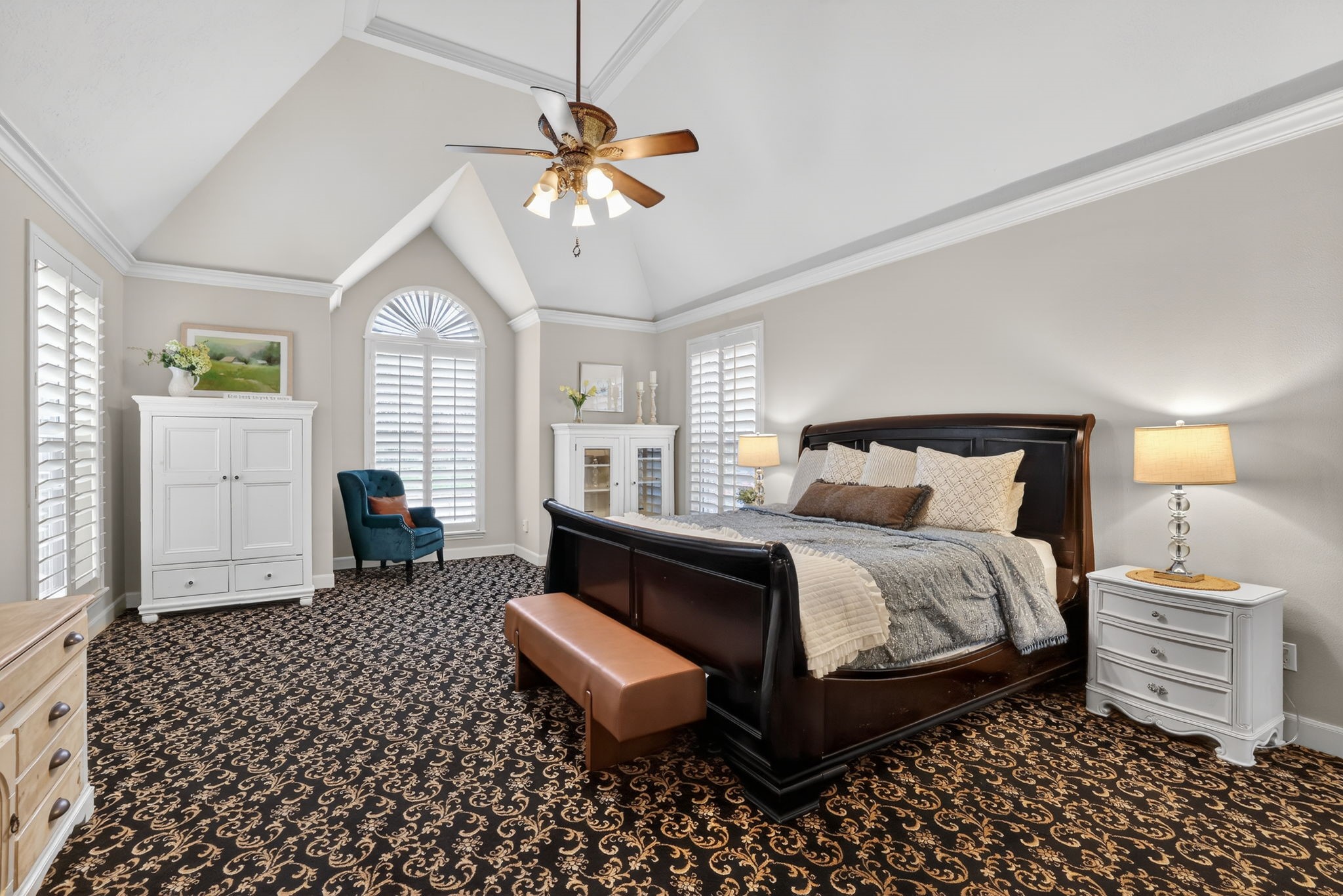 8711 Kennet Valley Road Spring, TX 77379 - Photo 15 of 37 a bedroom with a bed and a chandelier