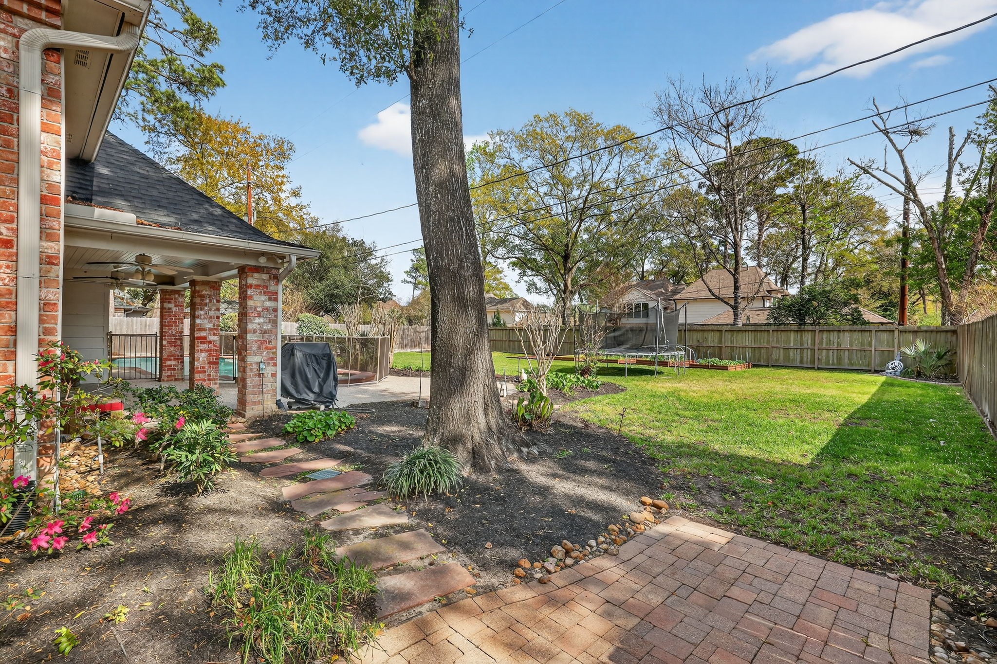 8711 Kennet Valley Road Spring, TX 77379 - Photo 29 of 37 a view of a garden with a fountain