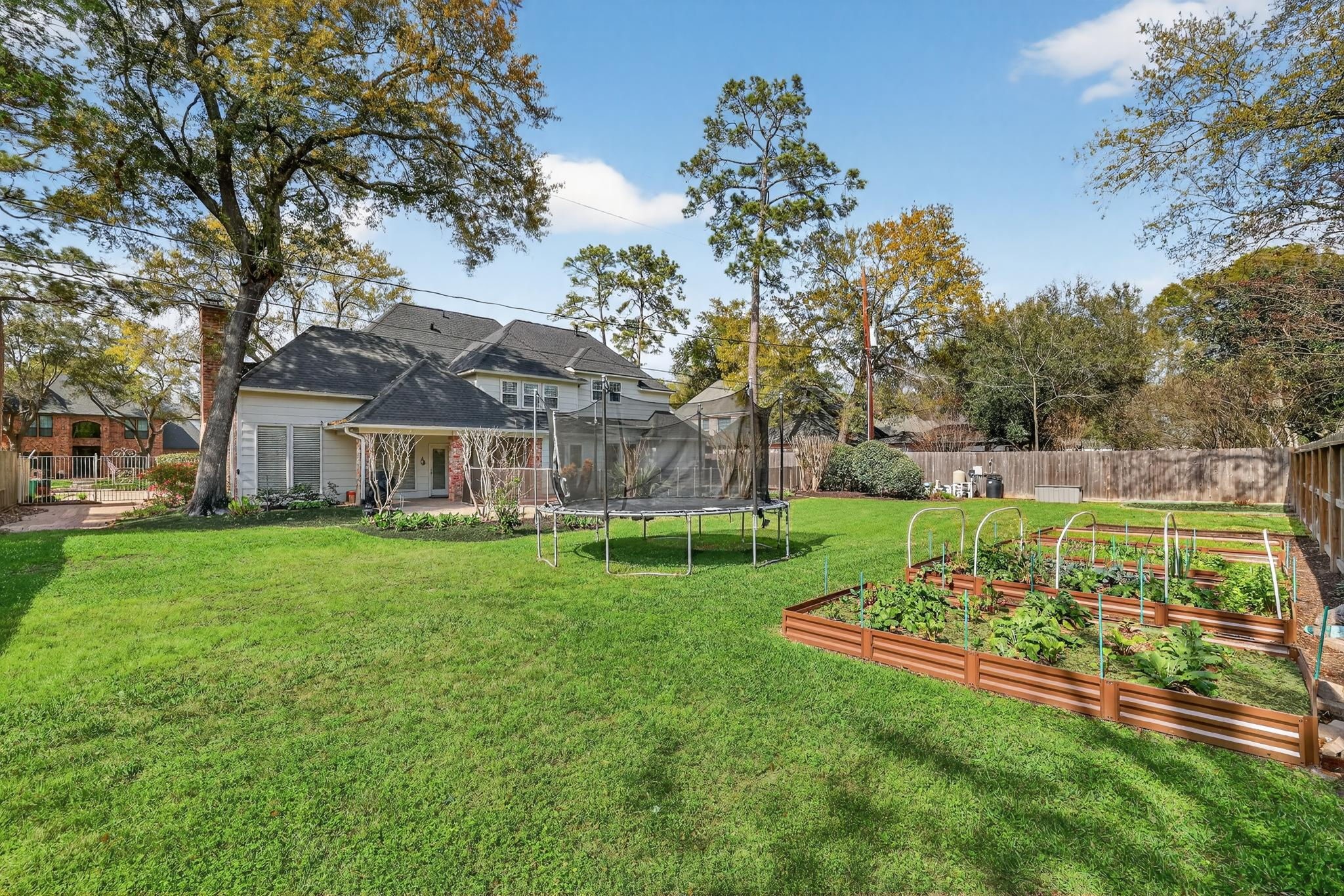 8711 Kennet Valley Road Spring, TX 77379 - Photo 30 of 37 a view of a house with a big yard