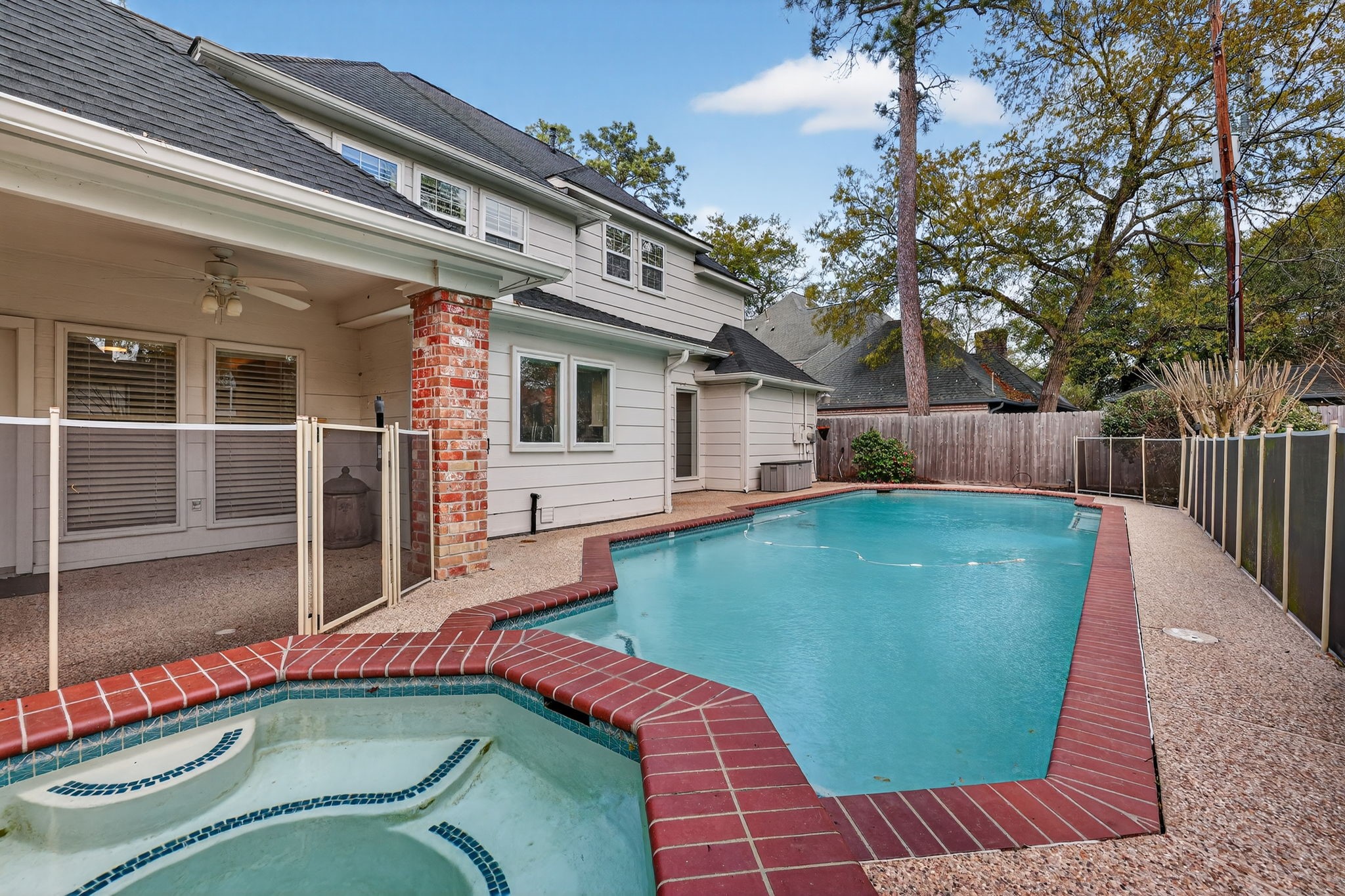 8711 Kennet Valley Road Spring, TX 77379 - Photo 32 of 37 a view of a swimming pool with a lounge chair