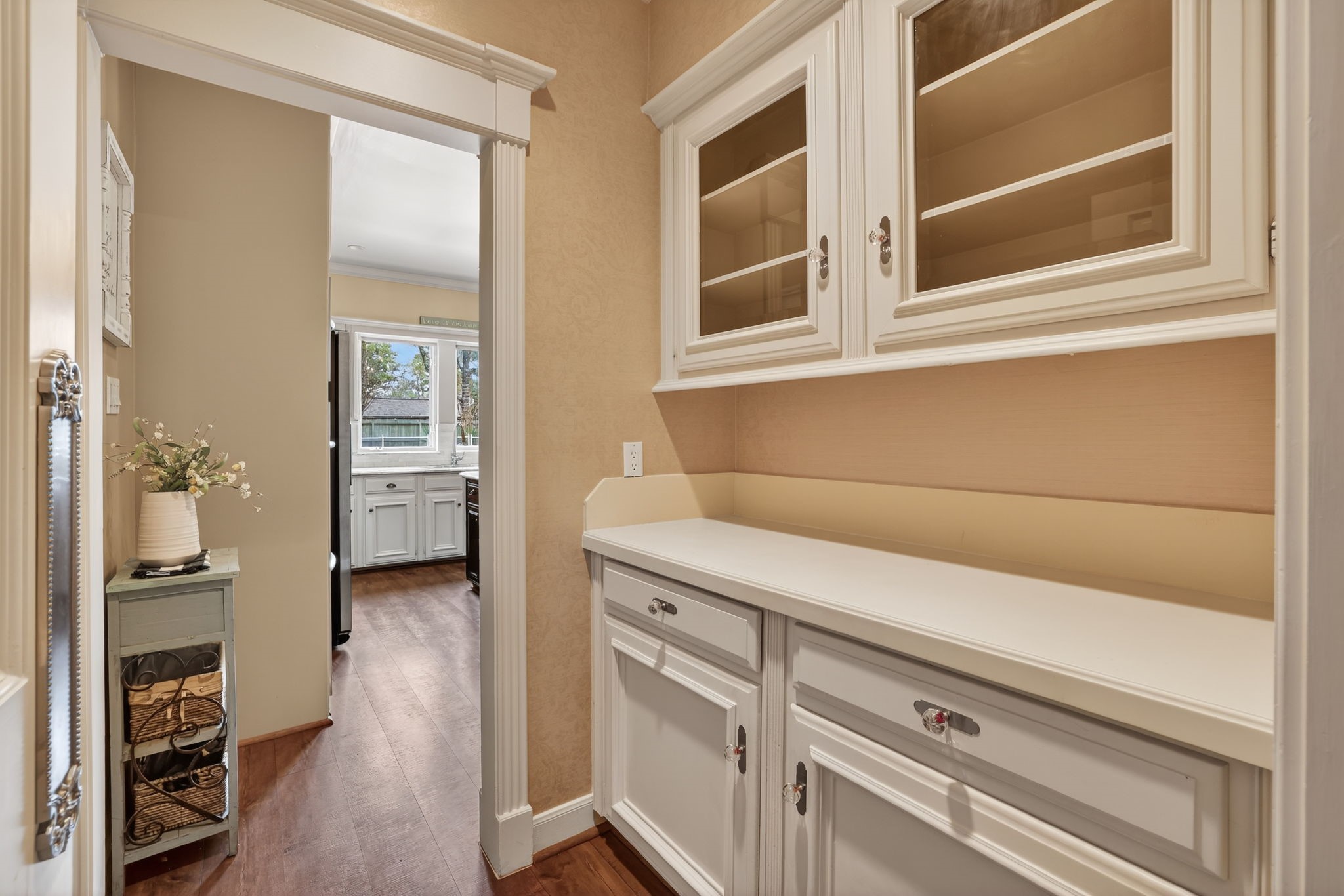 8711 Kennet Valley Road Spring, TX 77379 - Photo 7 of 37 a view of a kitchen with an empty space and a window