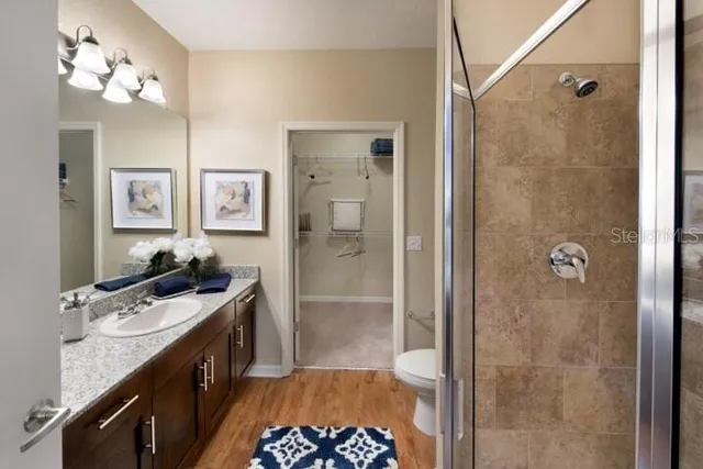 a bath room with a toilet