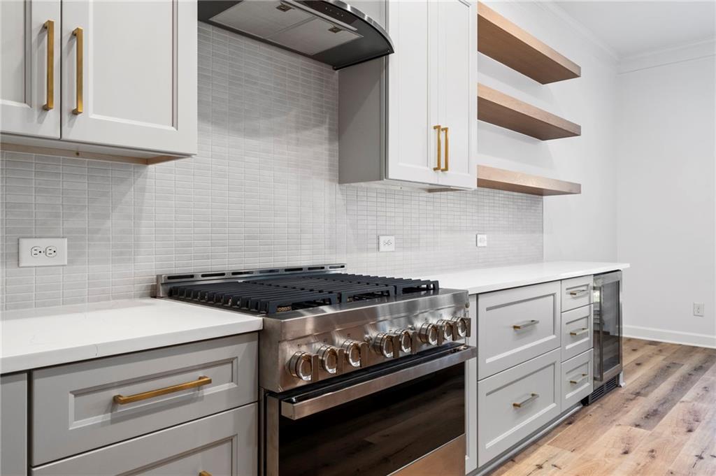 3628 Ashcroft Bend Atlanta, GA 30319 - Photo 15 of 44 a stove top oven sitting inside of a kitchen