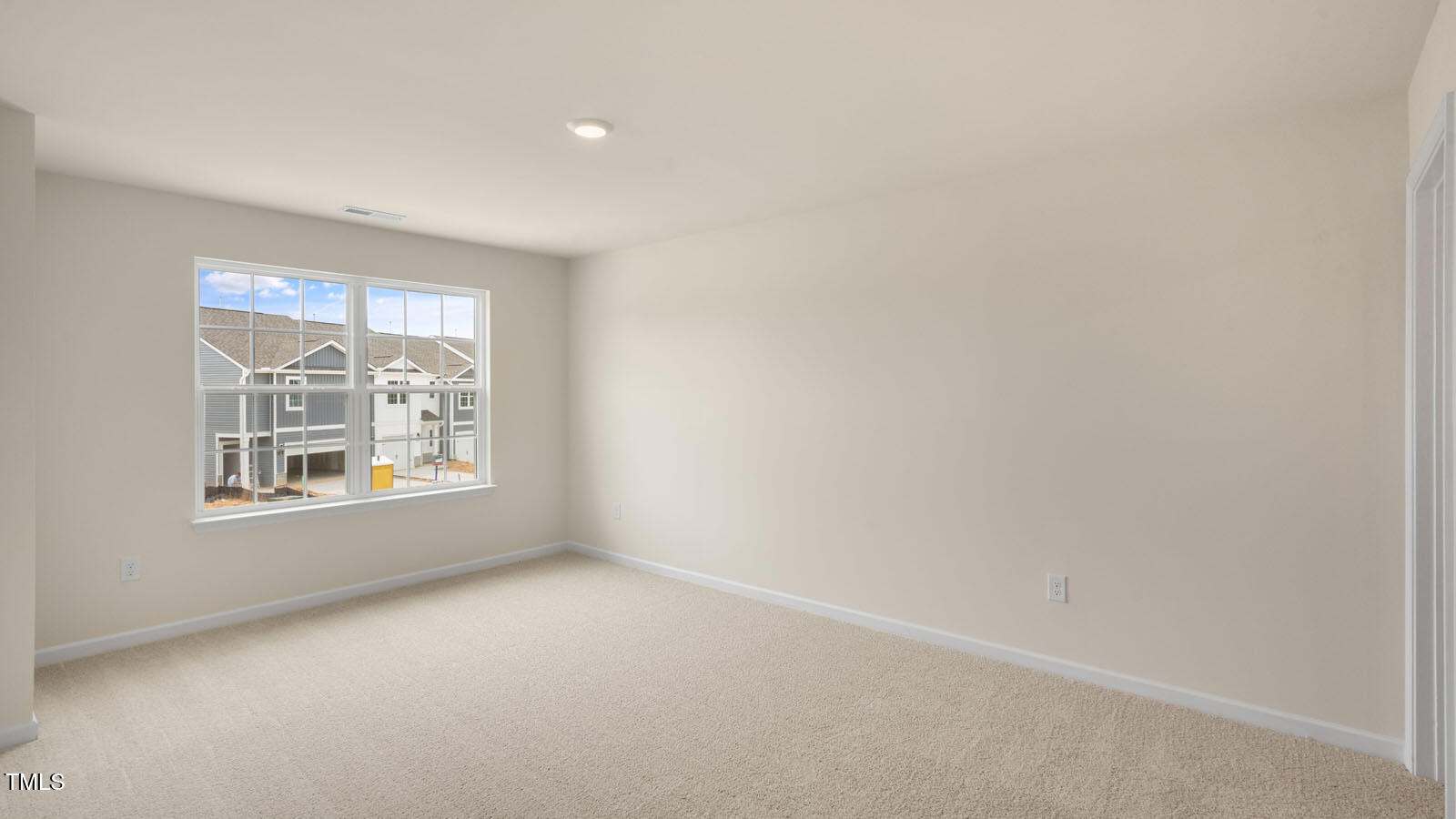 300 Perseus Street Angier, NC 27501 - Photo 17 of 26 an empty room with a window