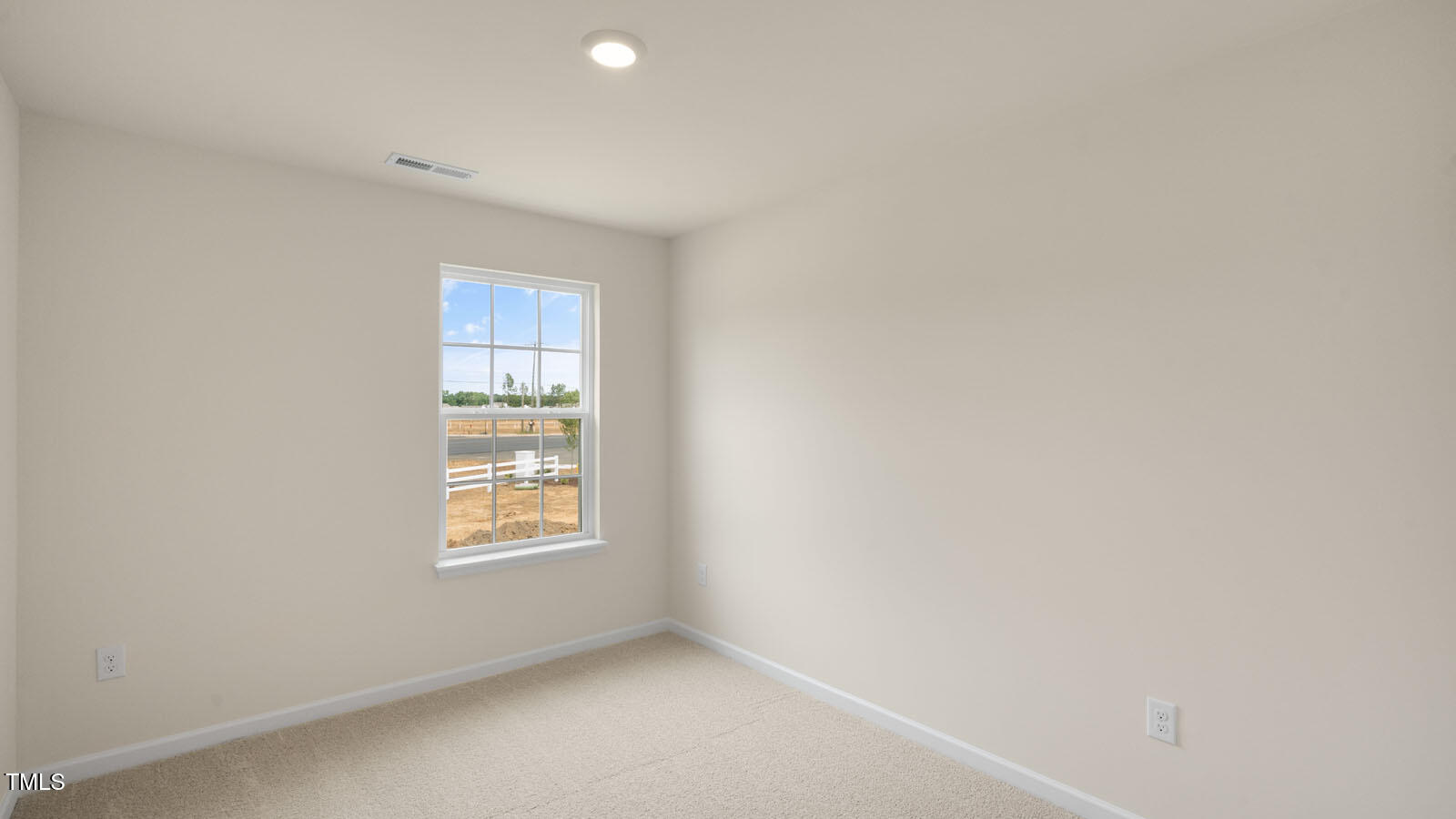 300 Perseus Street Angier, NC 27501 - Photo 18 of 26 a view of an empty room with a window