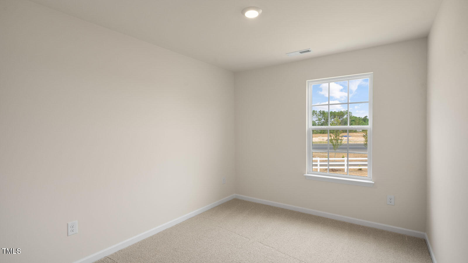 300 Perseus Street Angier, NC 27501 - Photo 19 of 26 an empty room with a window