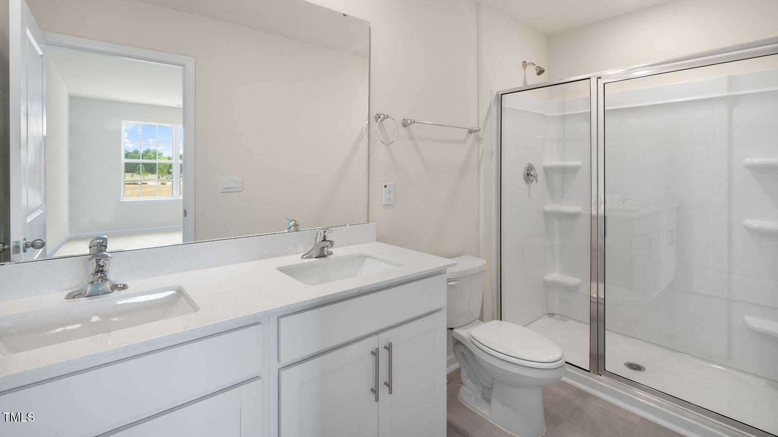 300 Perseus Street Angier, NC 27501 - Photo 20 of 26 a bathroom with a sink toilet and shower