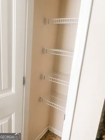 a bathroom with a glass door shower