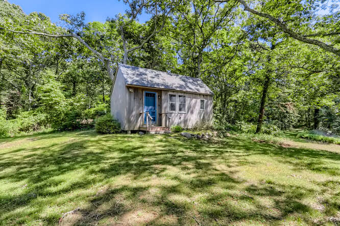 14 Ephriam Allen Road West Tisbury, MA 02568 - Photo 3 of 17 a backyard of a house with lots of green space