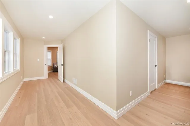 a view of an empty room and window