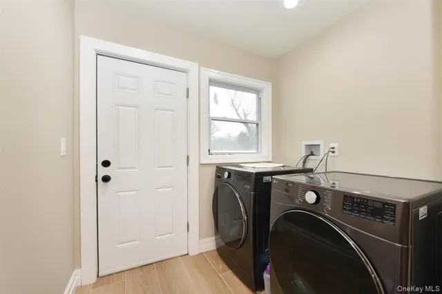 a utility room with dryer and washer