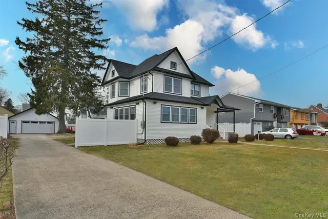 a house that has a big yard and more windows
