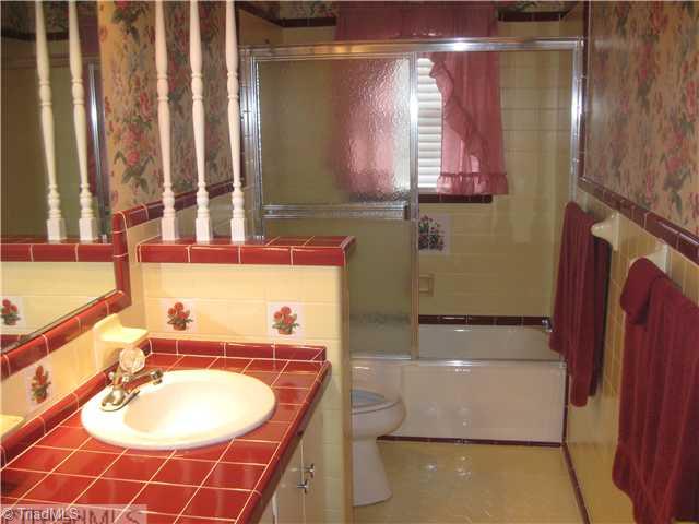 506 Barnes Road Winston-Salem, NC 27107 - Photo 6 of 14 Other. Hall full bath with recently replaced tile in beautiful condition.