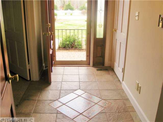 506 Barnes Road Winston-Salem, NC 27107 - Photo 9 of 14 Entry. Entry with custom slate and medallion of tile.
