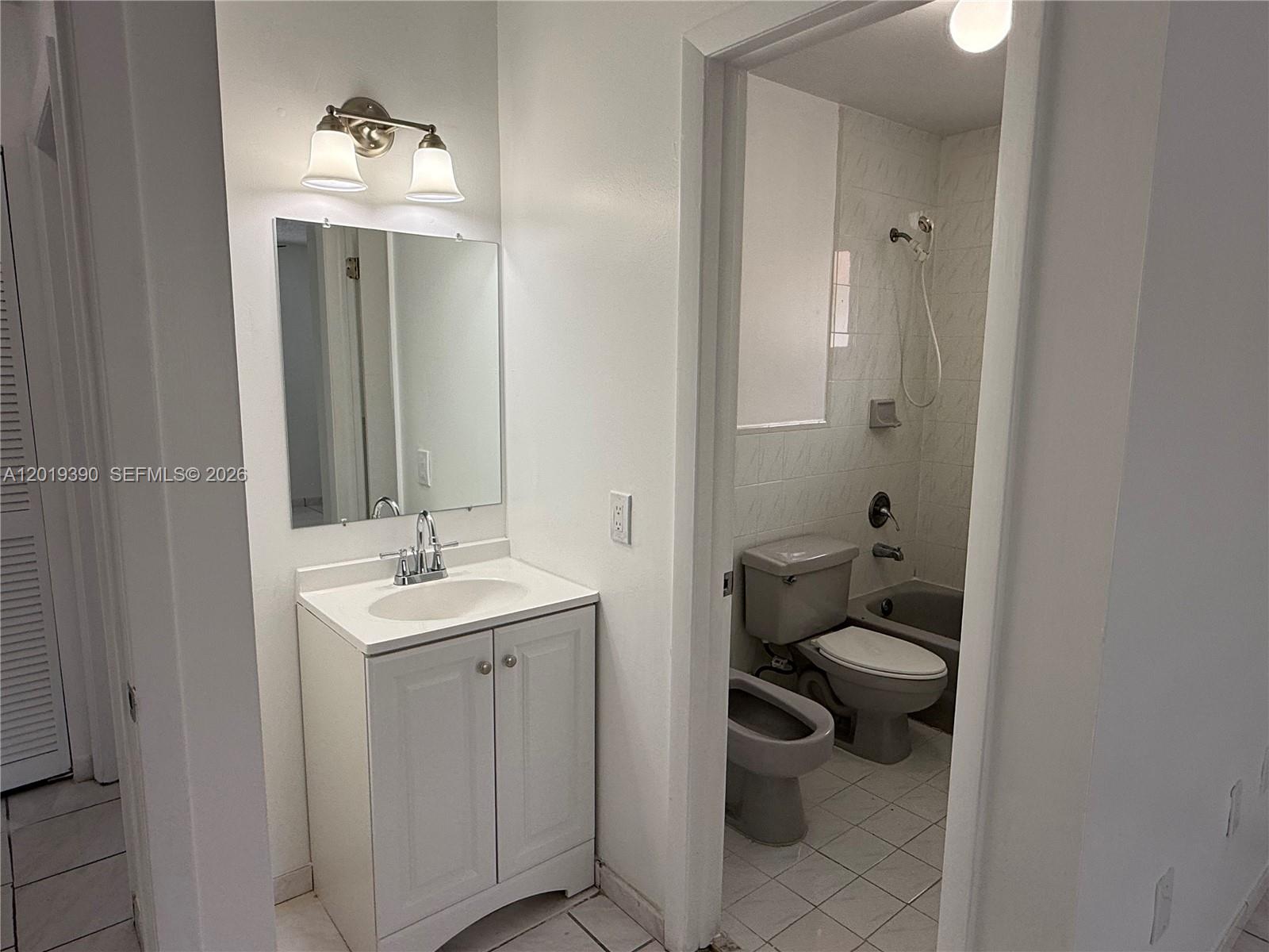 10101 West Okeechobee Road, Unit 9202 Hialeah Gardens, FL 33016 - Photo 25 of 32 Brand New Vanity, Mirror and light fixture