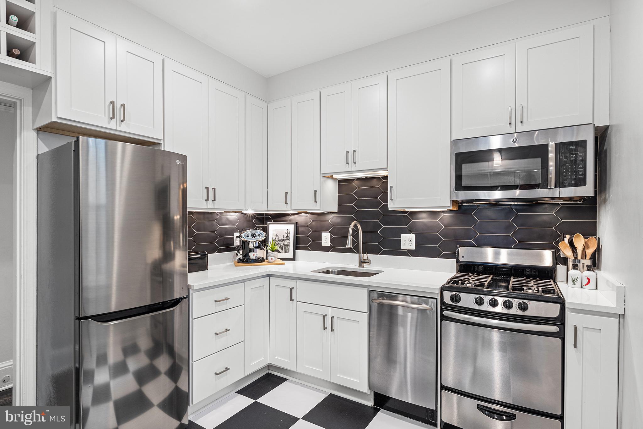 3022 R Street Northwest Washington, DC 20007 - Photo 13 of 39 New appliances, gorgeous cabinets, new backsplash