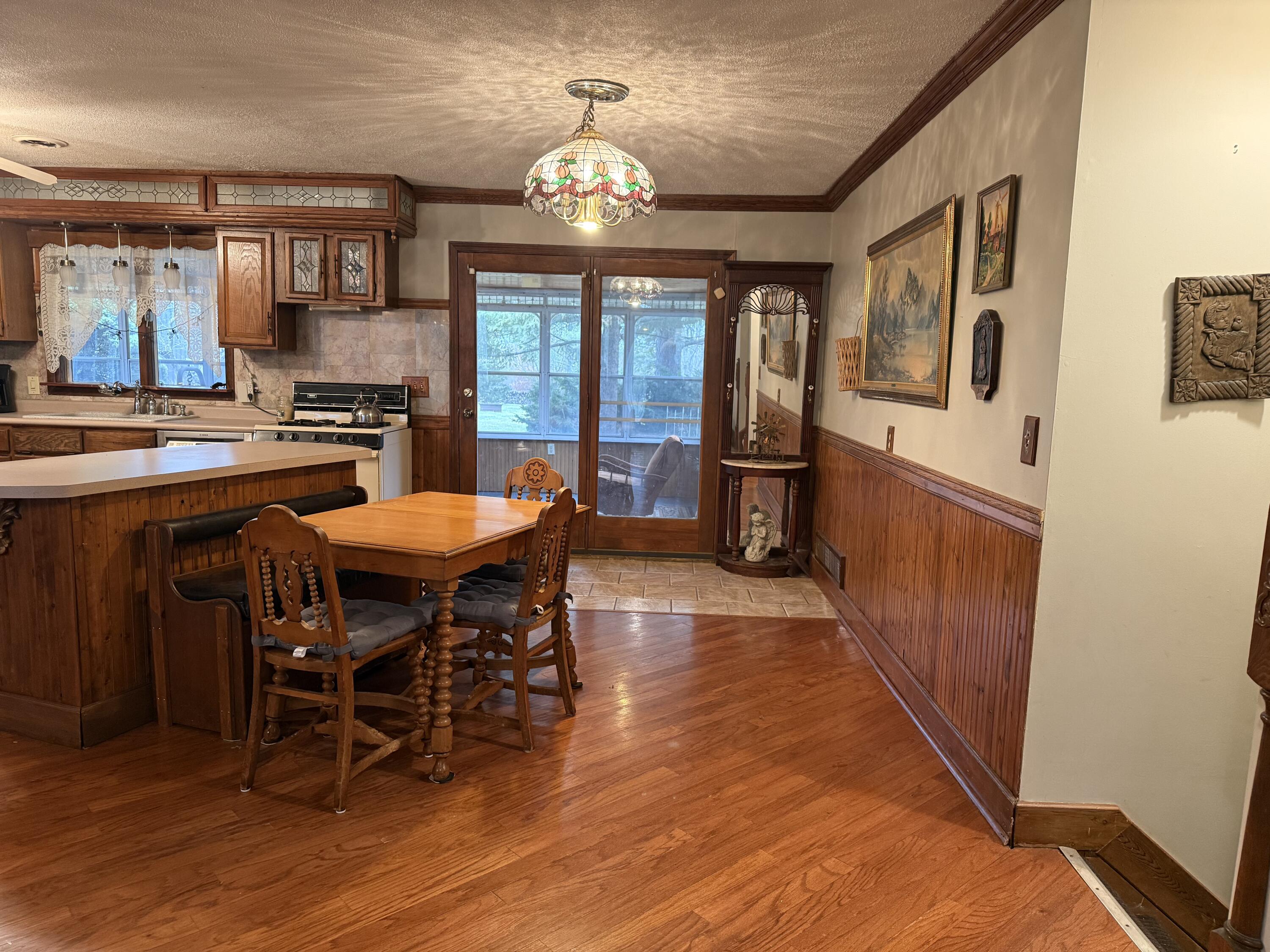 368 South 600th Street West Hebron, IN 46341 - Photo 15 of 87 a view of a dining room with furniture window and wooden floor