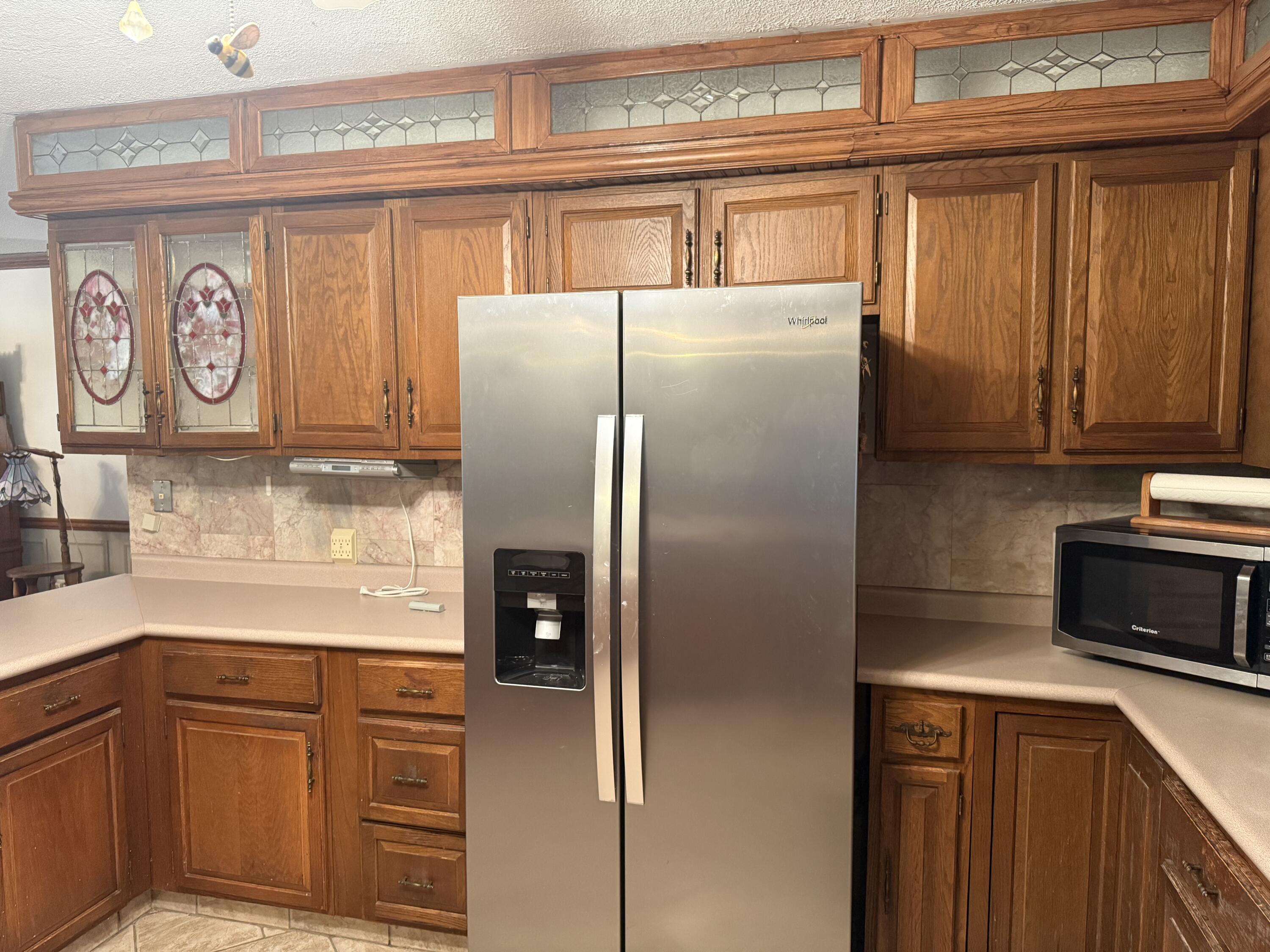 368 South 600th Street West Hebron, IN 46341 - Photo 17 of 87 a kitchen with stainless steel appliances granite countertop a refrigerator and a microwave