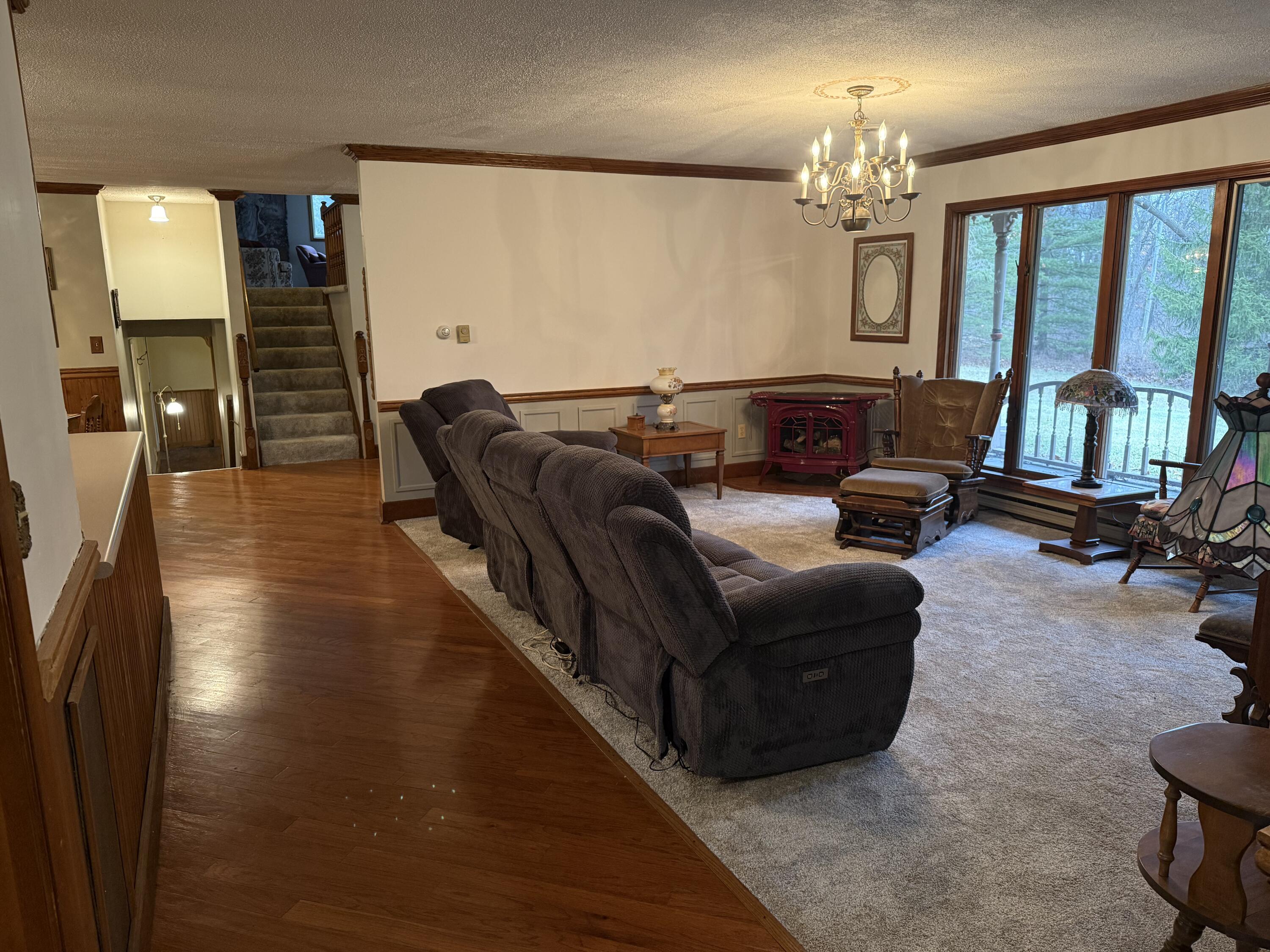 368 South 600th Street West Hebron, IN 46341 - Photo 23 of 87 a living room with furniture and a chandelier