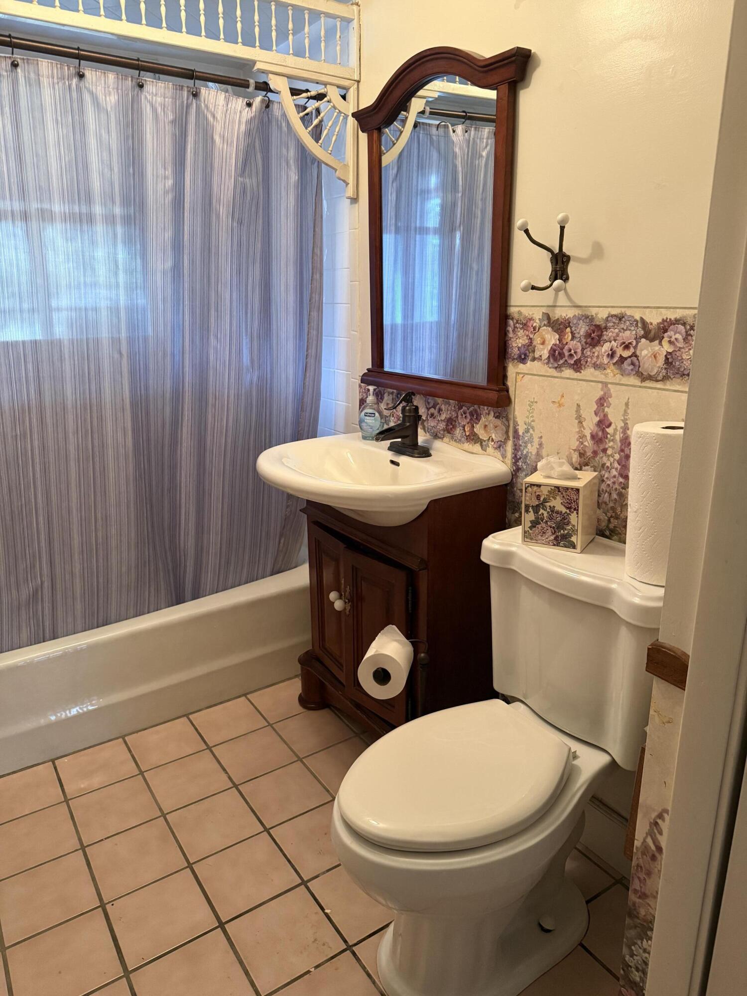 368 South 600th Street West Hebron, IN 46341 - Photo 27 of 87 a bathroom with a sink a toilet and mirror