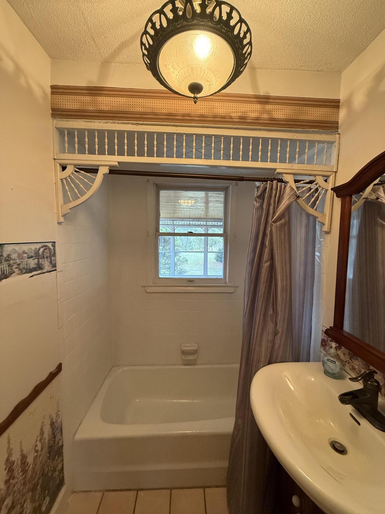 368 South 600th Street West Hebron, IN 46341 - Photo 28 of 87 a bathroom with a sink and a mirror