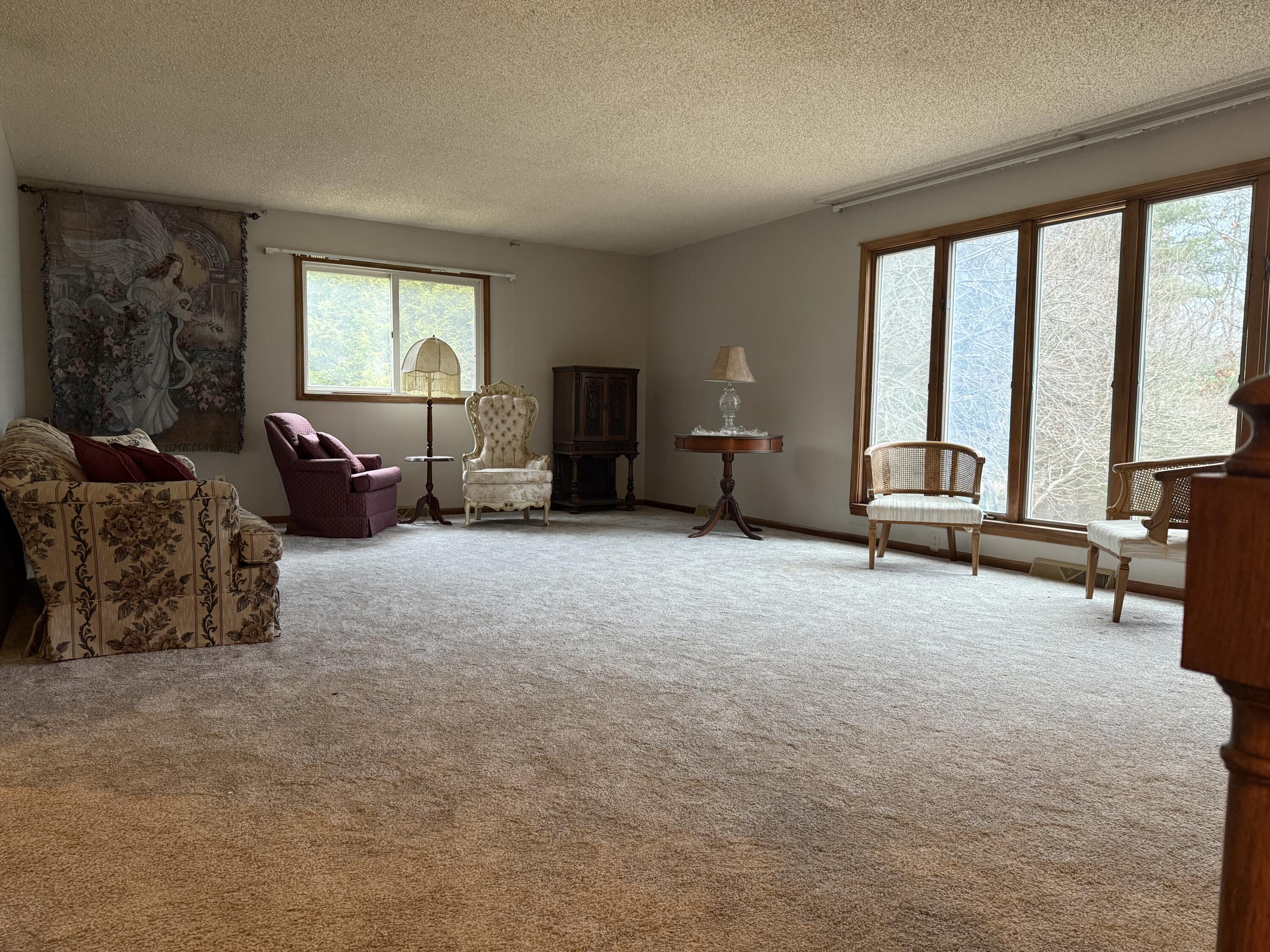 368 South 600th Street West Hebron, IN 46341 - Photo 35 of 87 a living room with furniture and a large window