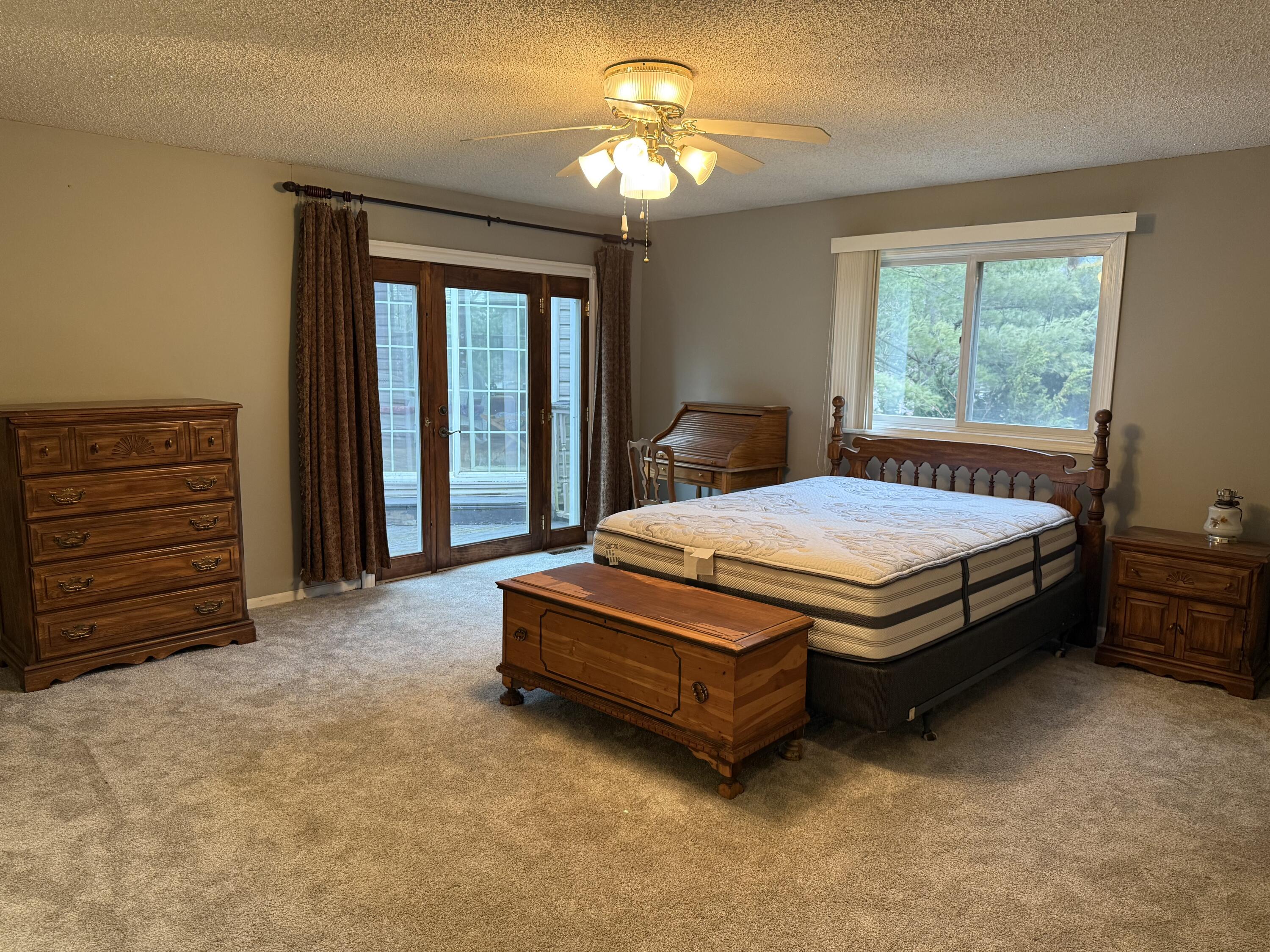 368 South 600th Street West Hebron, IN 46341 - Photo 39 of 87 a bed sitting in a spacious bedroom next to a window