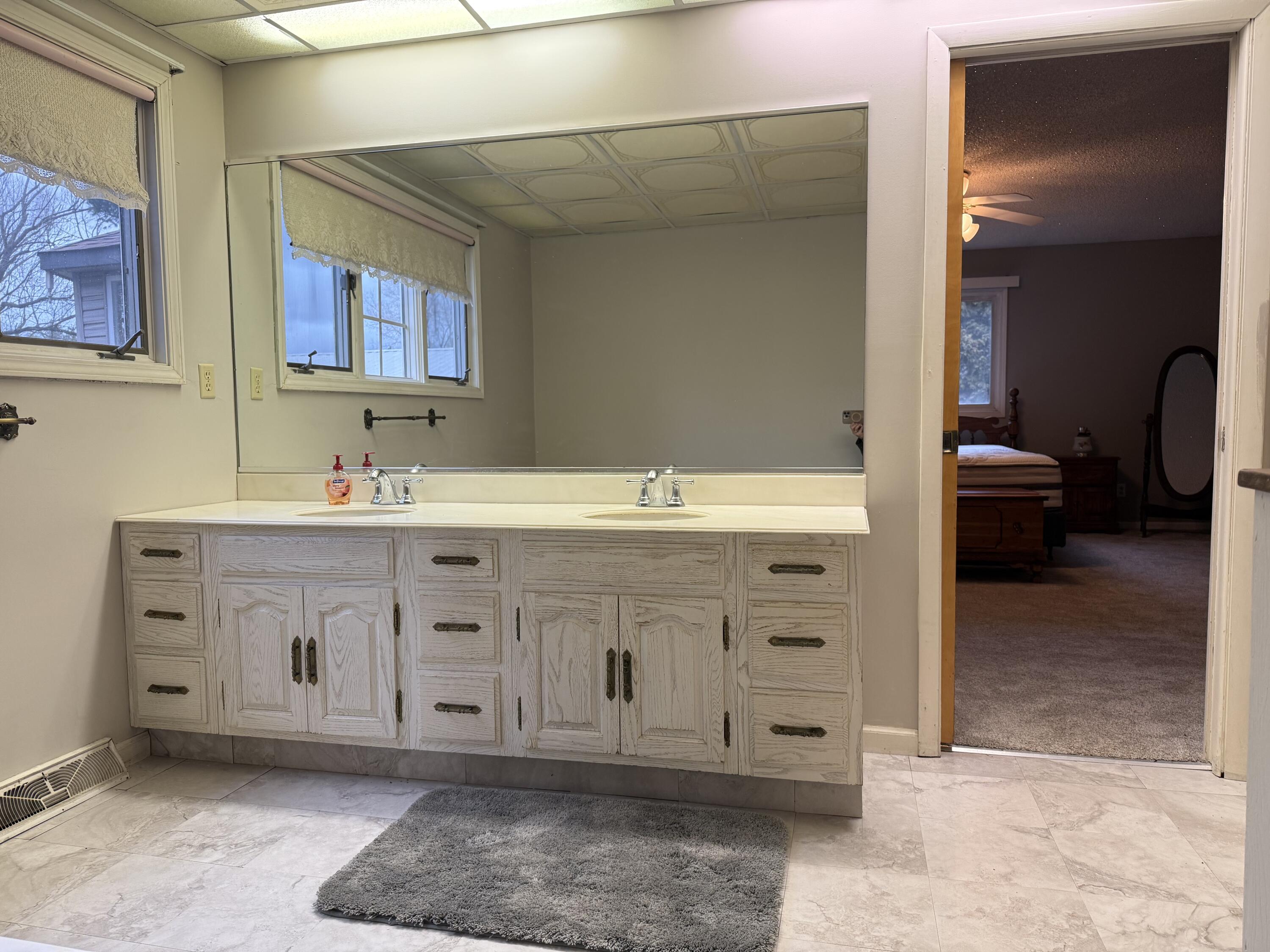 368 South 600th Street West Hebron, IN 46341 - Photo 43 of 87 a spacious bathroom with a double vanity sink a mirror and a