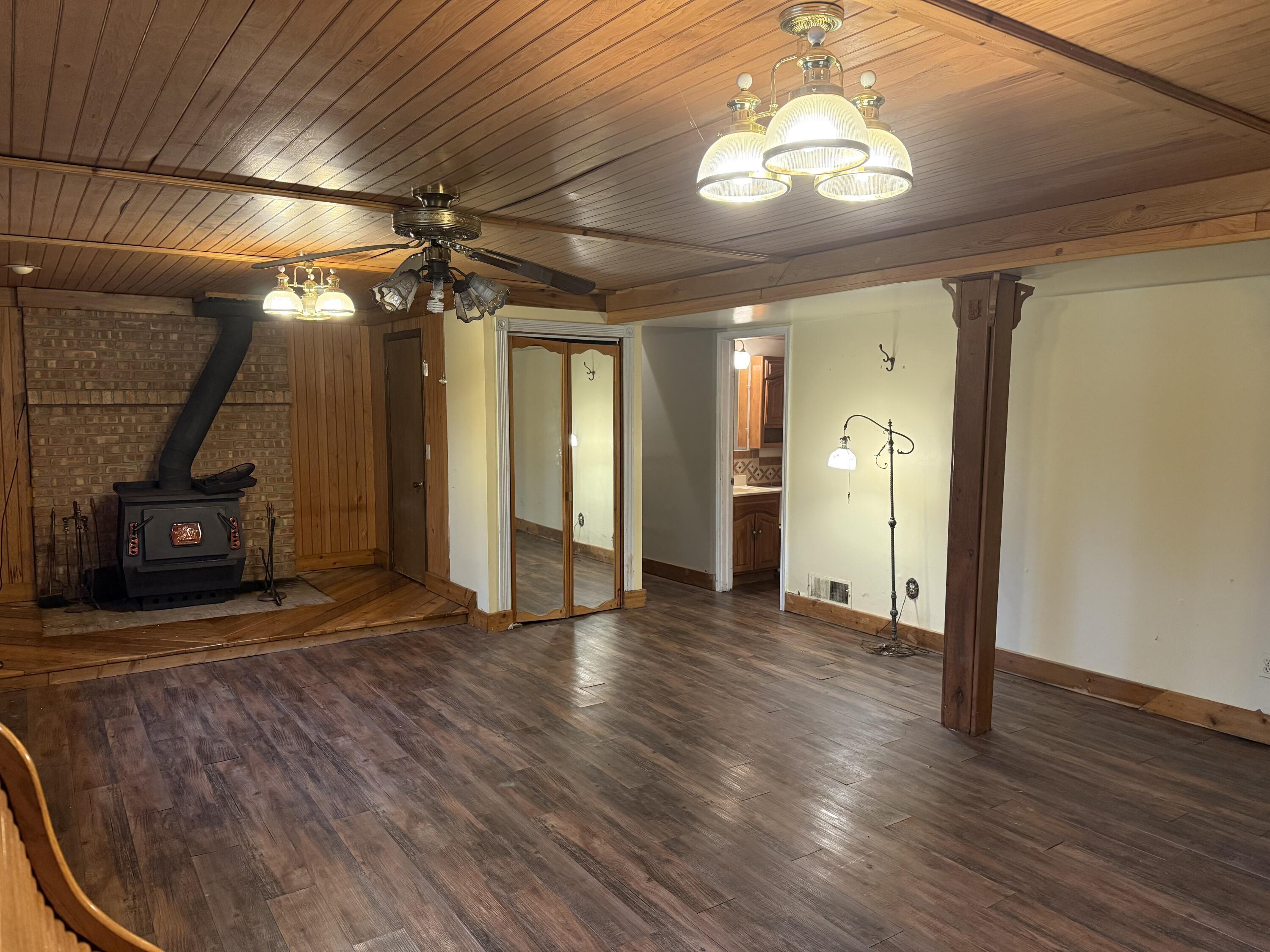 368 South 600th Street West Hebron, IN 46341 - Photo 50 of 87 a view of a livingroom with wooden floor and a ceiling fan
