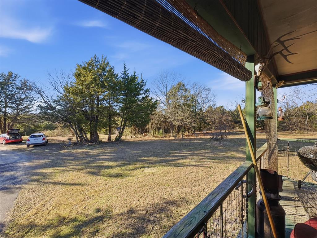266 Bennett Road Ennis, TX 75119 - Photo 3 of 6 a view of a swimming pool with a balcony