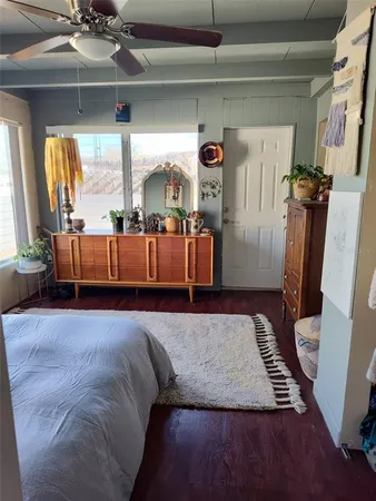 a living room with a couch and a window