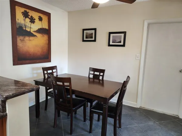 a view of a dining room with furniture
