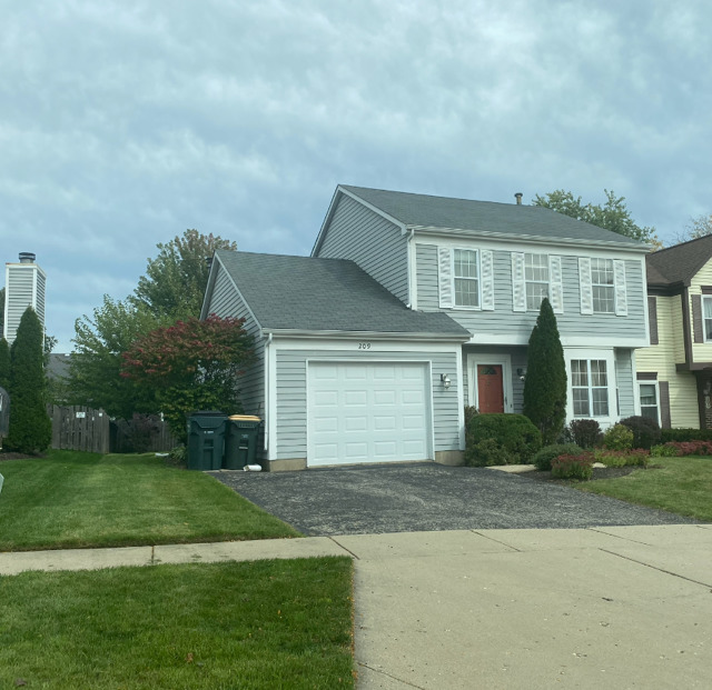 209 North Southport Road Mundelein, IL 60060 - Photo 2 of 18 front view of house with a yard