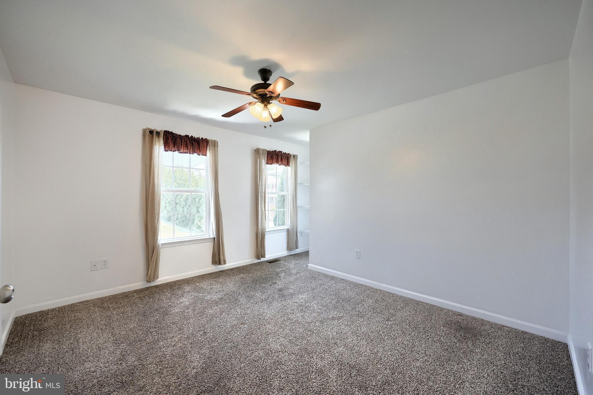 425 Lakeview Drive Spring Grove, PA 17362 - Photo 32 of 51 a view of room with a ceiling fan and window