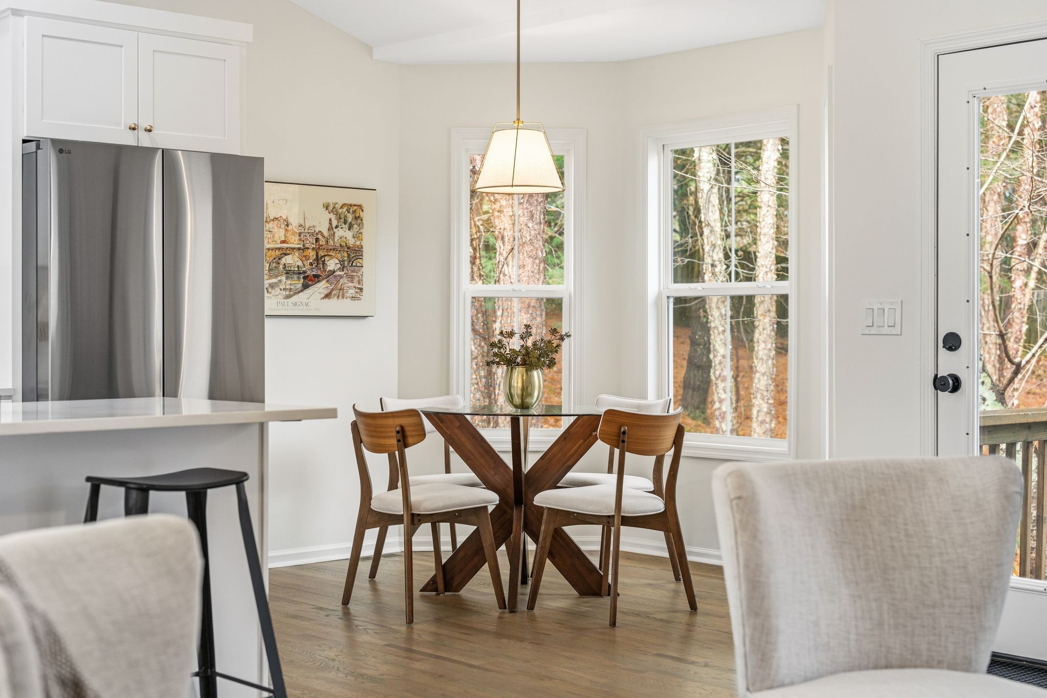 209 Pin Oak Court Spring Hill, TN 37174 - Photo 25 of 53 a view of a dining room with furniture window and wooden floor