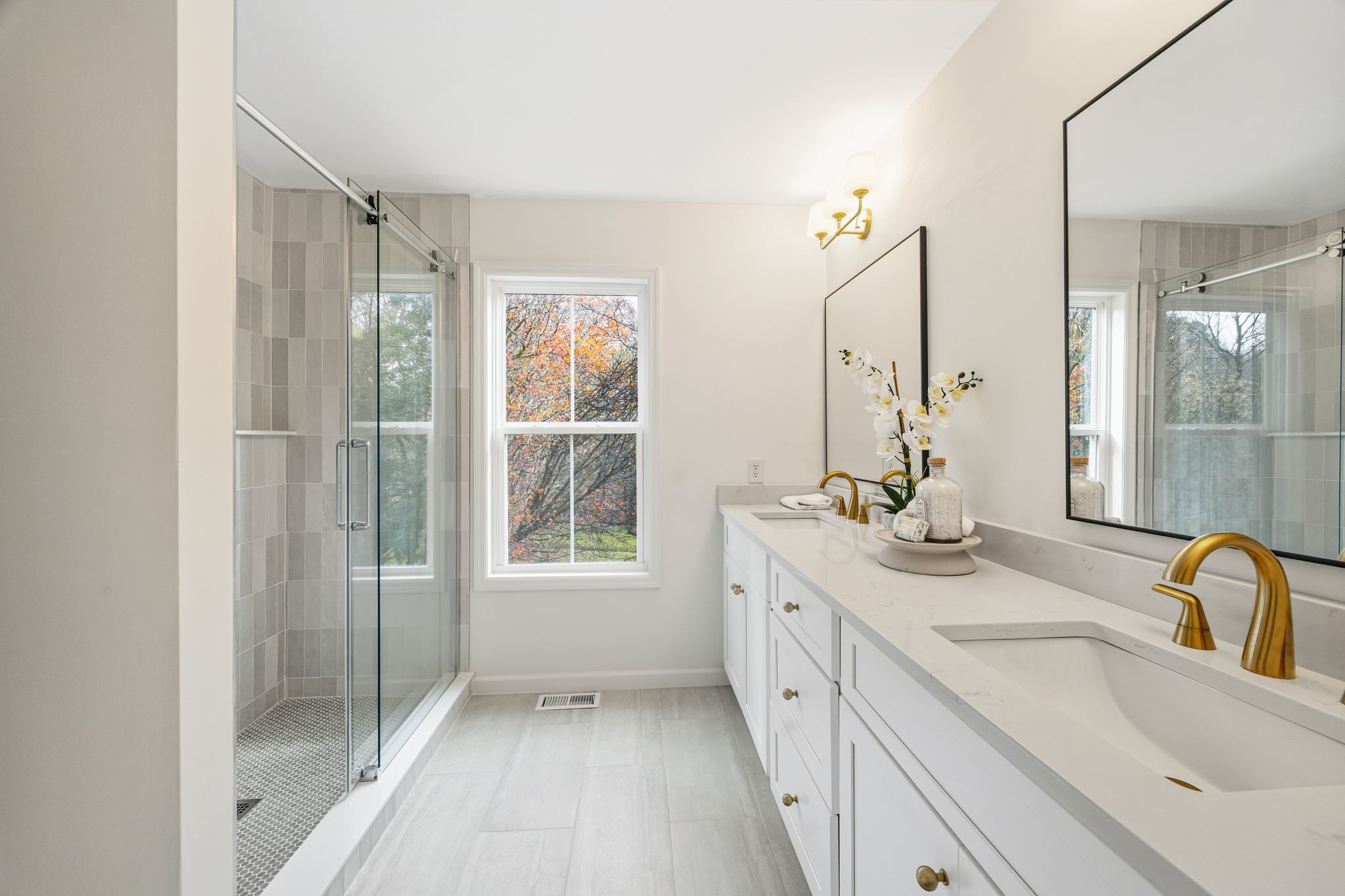 209 Pin Oak Court Spring Hill, TN 37174 - Photo 35 of 53 a bathroom with a sink double vanity and a mirror