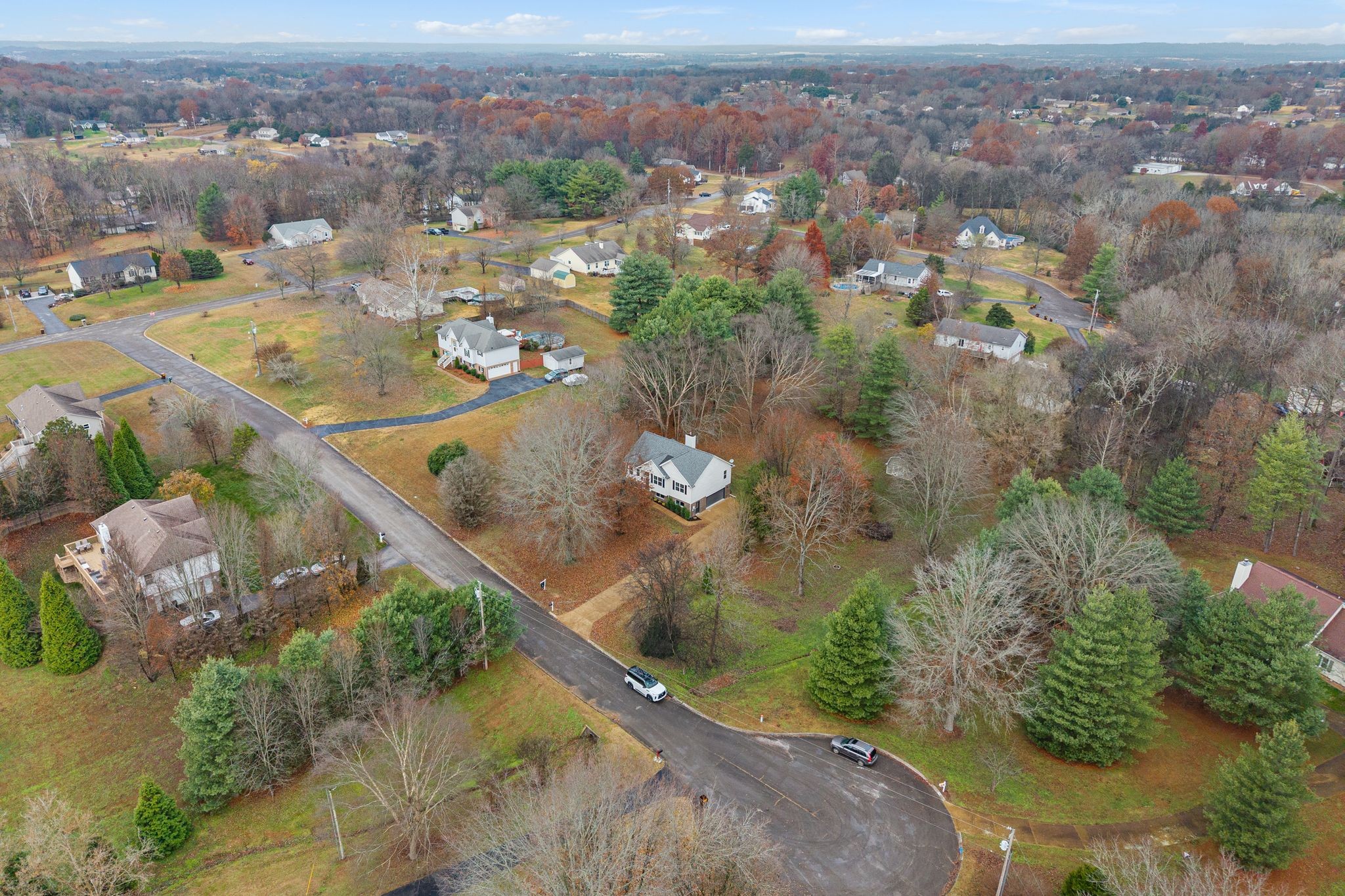 209 Pin Oak Court Spring Hill, TN 37174 - Photo 52 of 53 an aerial view of a residential houses with outdoor space and trees