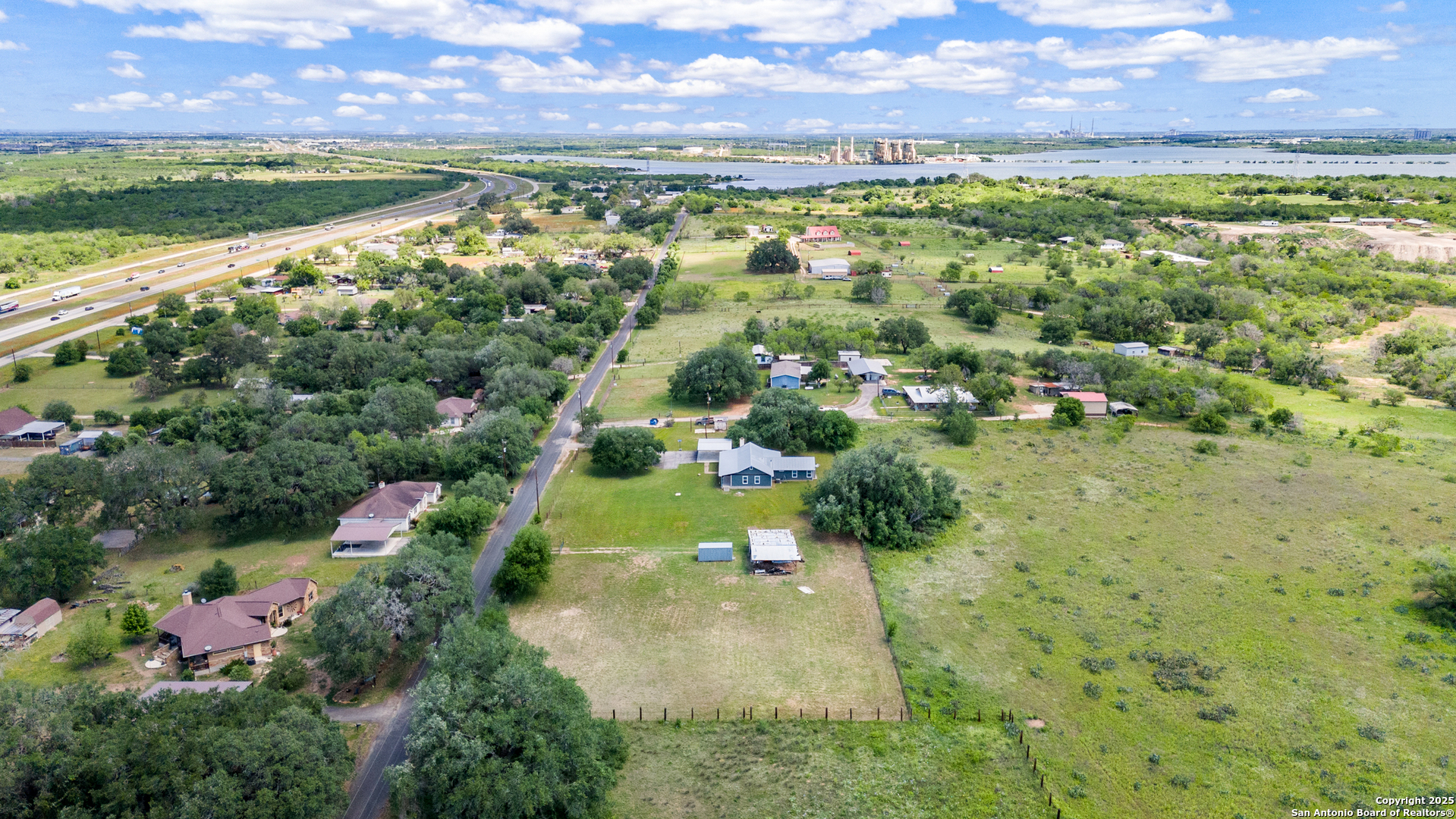 18950 Southton Road Elmendorf, TX 78112 - Photo 11 of 16 a view of lake with houses