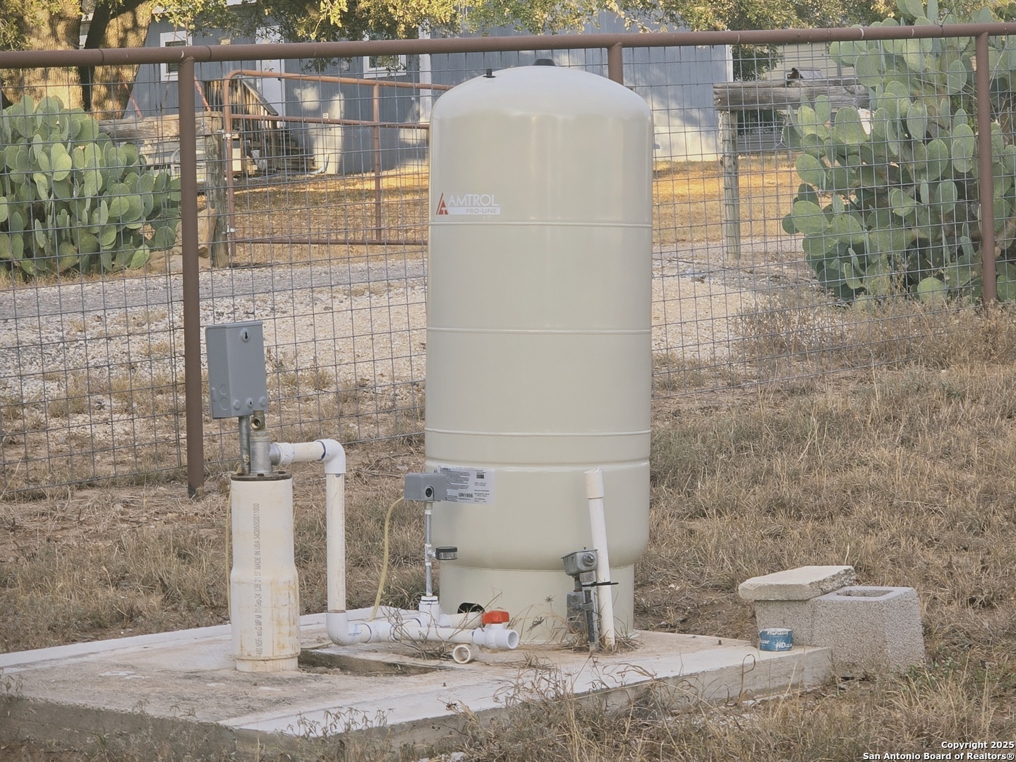 18950 Southton Road Elmendorf, TX 78112 - Photo 16 of 16 a bathroom with a toilet and a shower
