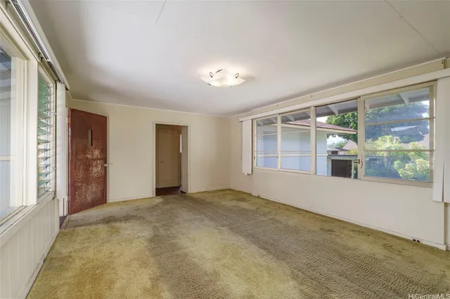 an empty room with windows