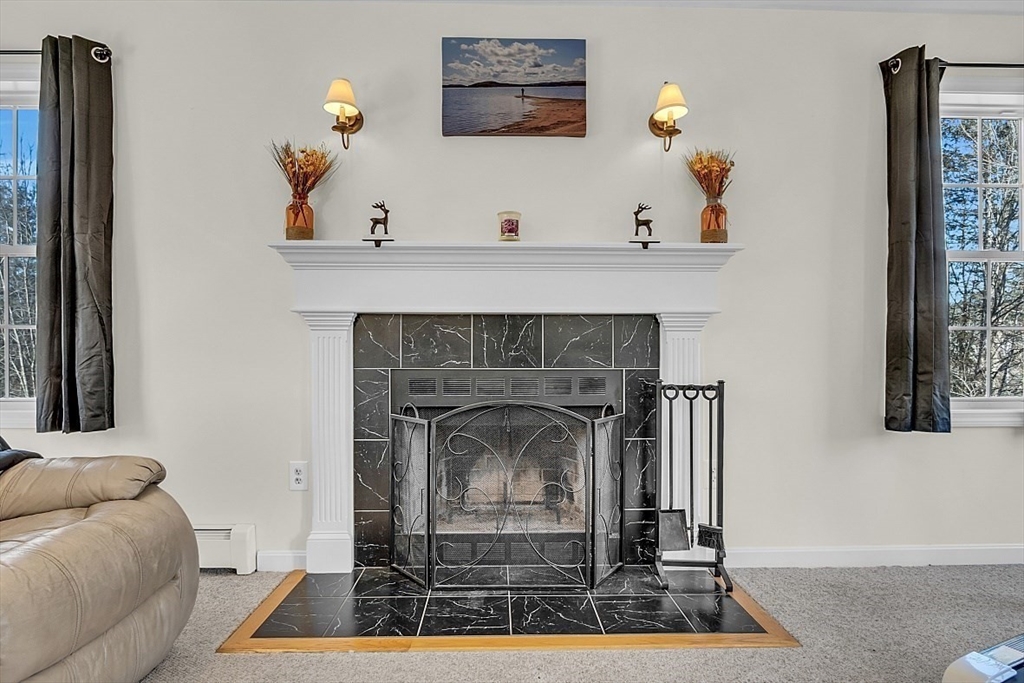 365 State Road Phillipston, MA 01331 - Photo 11 of 25 a living room with furniture and a fireplace