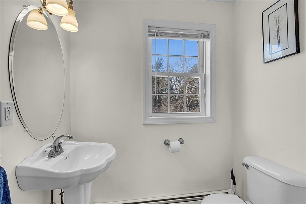 365 State Road Phillipston, MA 01331 - Photo 13 of 25 a bathroom with a sink toilet and mirror