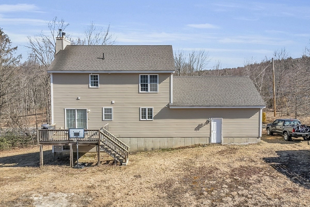 365 State Road Phillipston, MA 01331 - Photo 23 of 25 a side view of a house with a yard