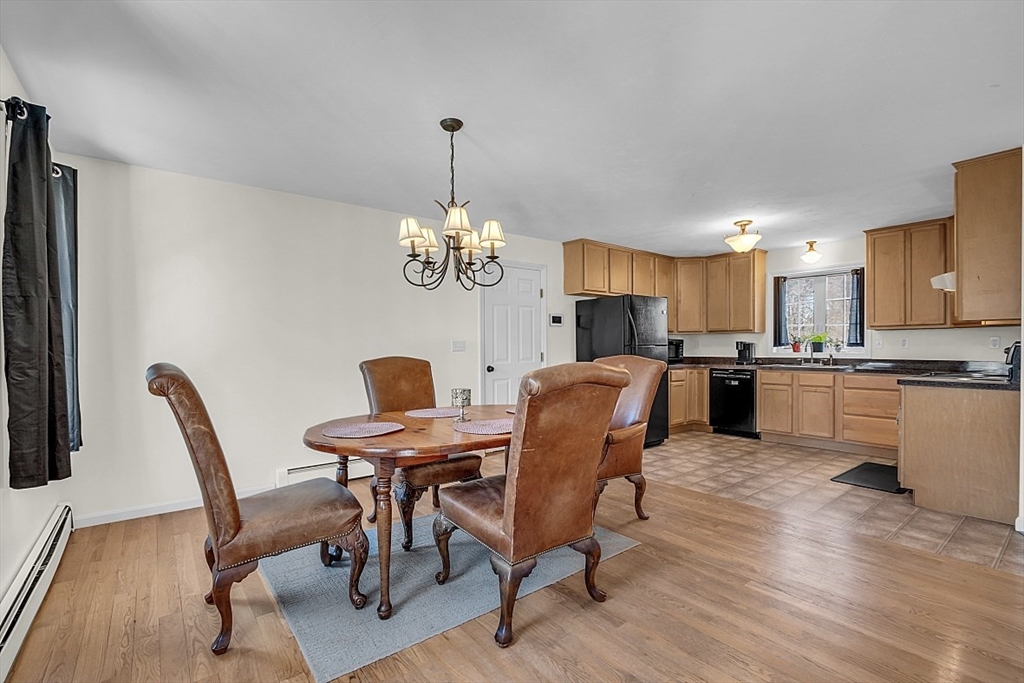 365 State Road Phillipston, MA 01331 - Photo 3 of 25 a view of a dining room with furniture and wooden floor