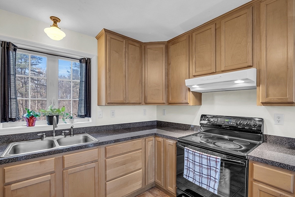 365 State Road Phillipston, MA 01331 - Photo 7 of 25 a kitchen with granite countertop a stove sink and cabinets