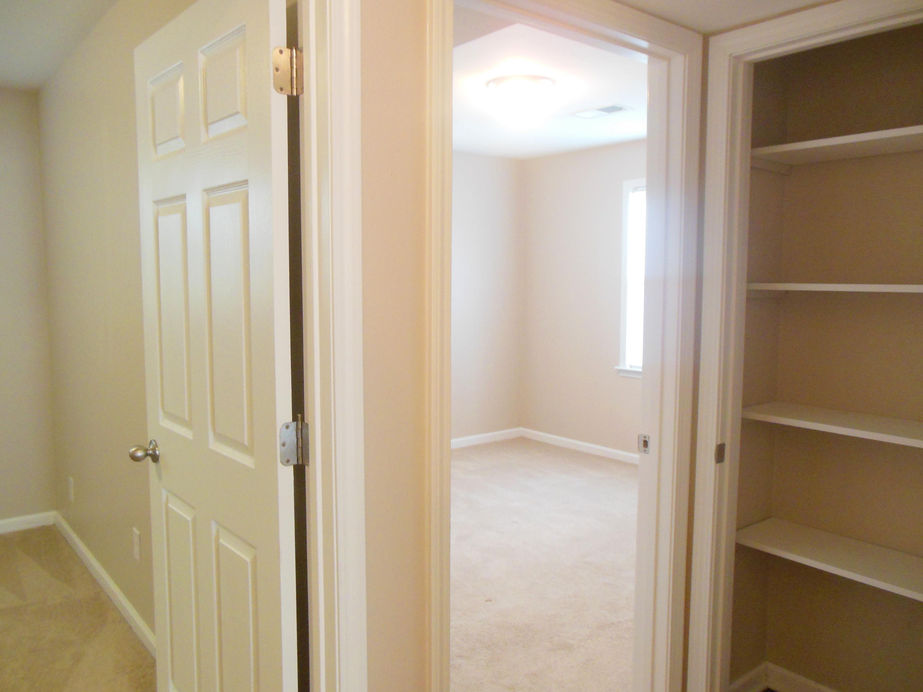 701 Riverland Road Southeast Roanoke, VA 24014 - Photo 14 of 33 a view of a bathroom with a glass door