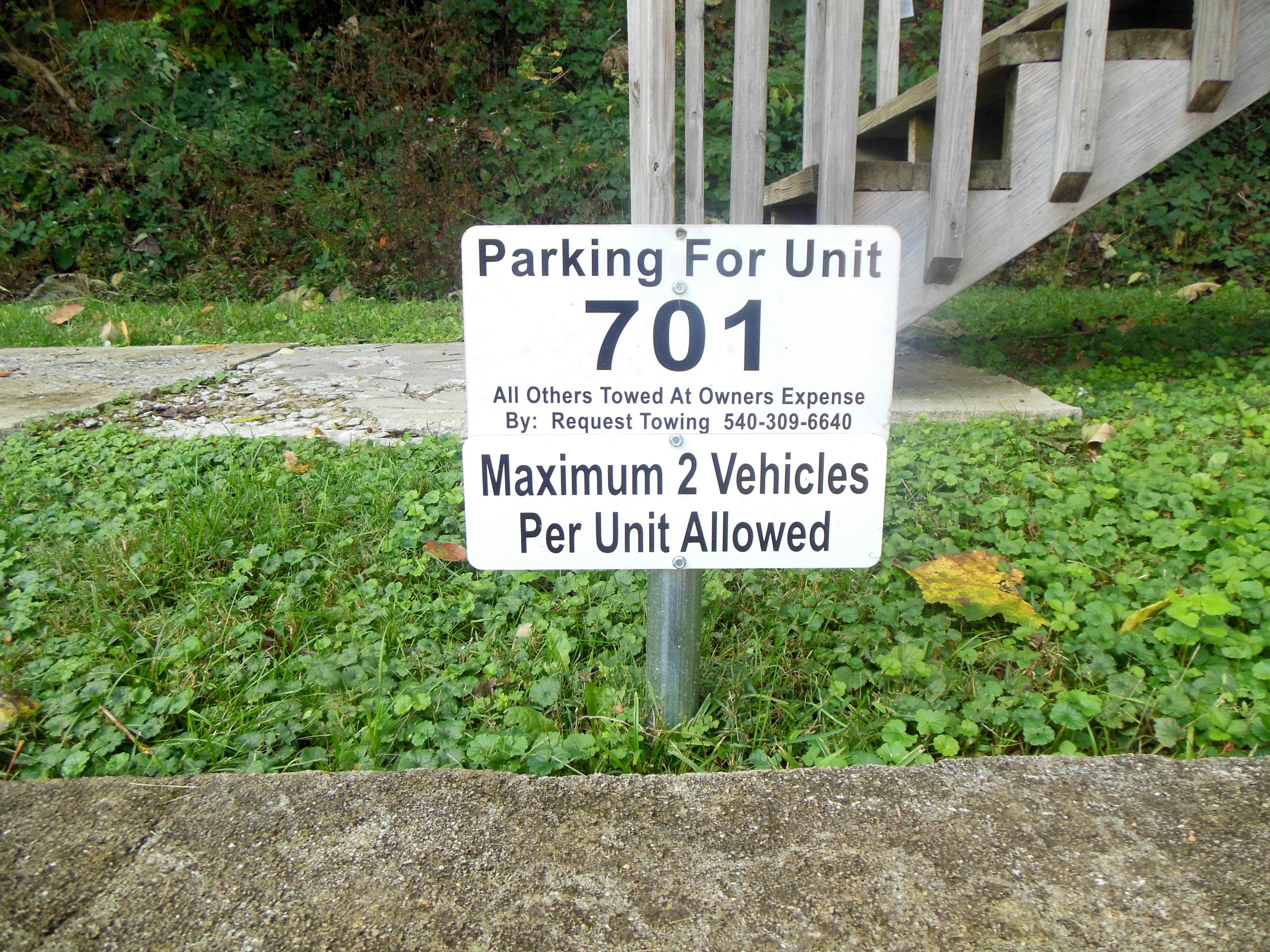 701 Riverland Road Southeast Roanoke, VA 24014 - Photo 3 of 33 a sign on the side of the road
