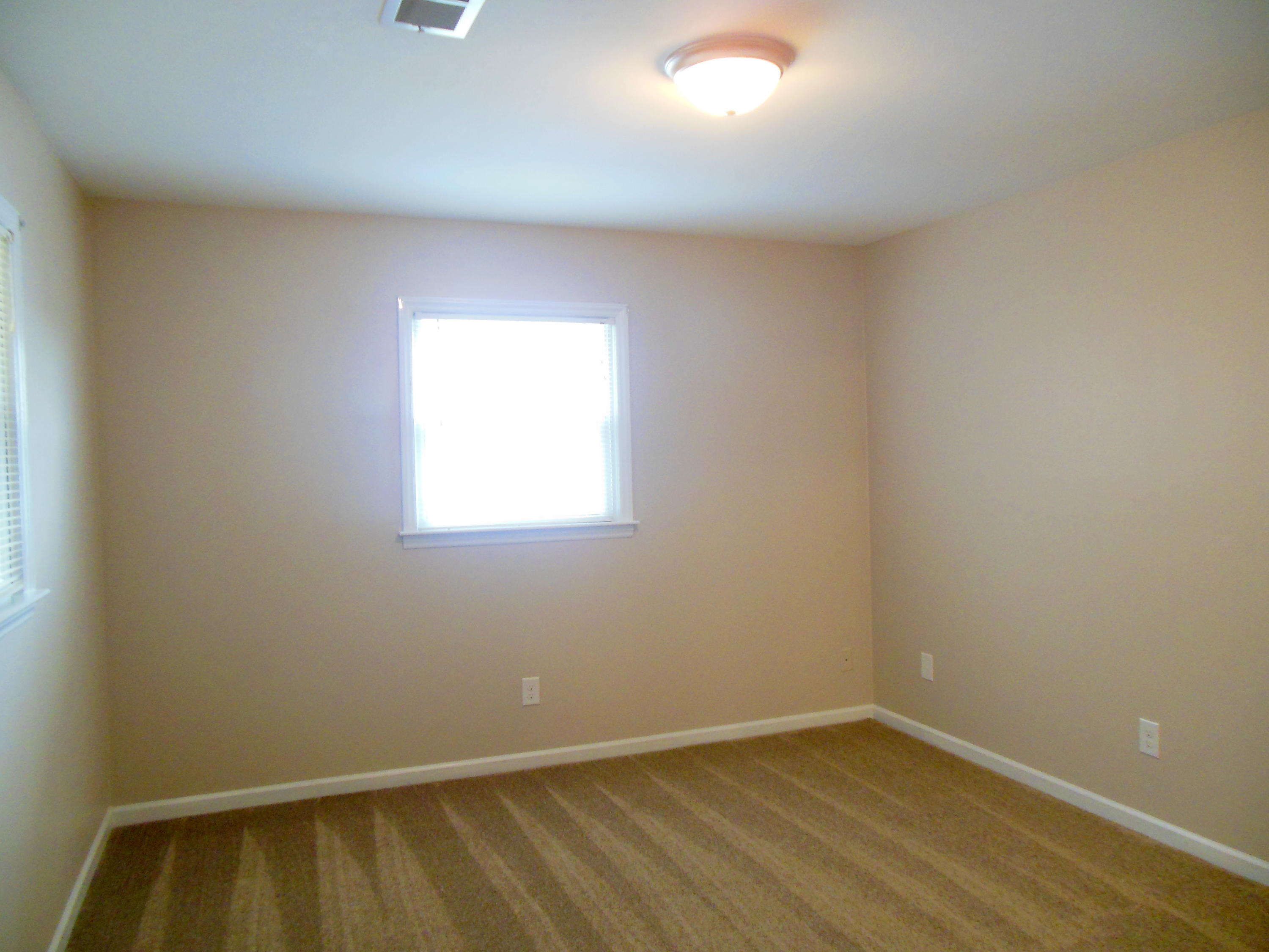 701 Riverland Road Southeast Roanoke, VA 24014 - Photo 31 of 33 an empty room with a window