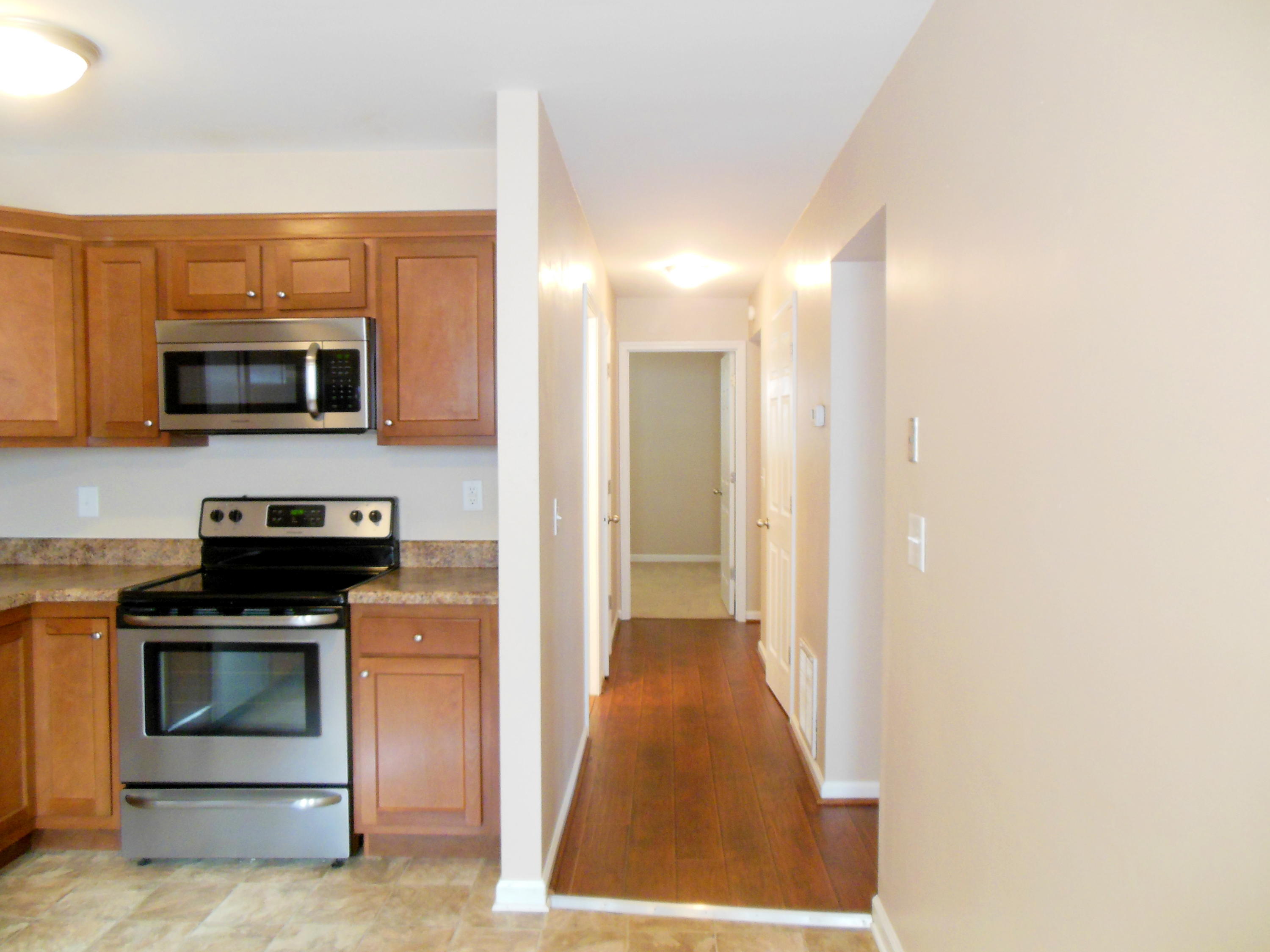 701 Riverland Road Southeast Roanoke, VA 24014 - Photo 6 of 33 a view of a kitchen from a hallway