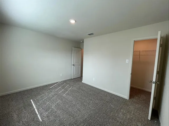 an empty room with a natural light